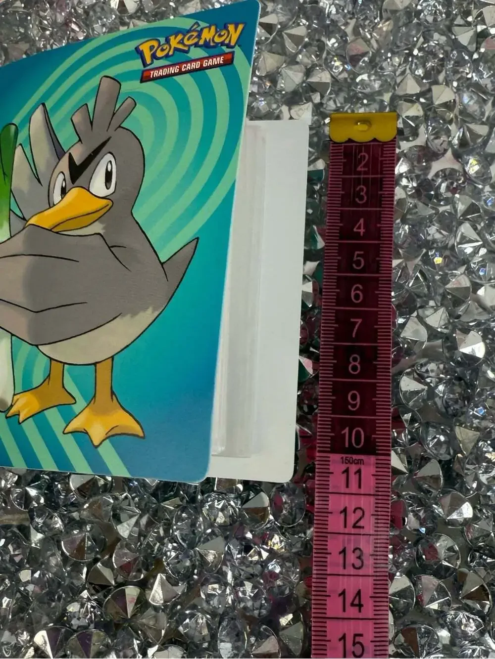 Pokemon trading card book Gray Duck Card Binder with Teal/Blue Swirl Background